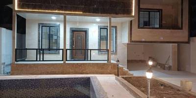 فروش 270 متر زمین  150 متر بنا‌ استخر دار 000